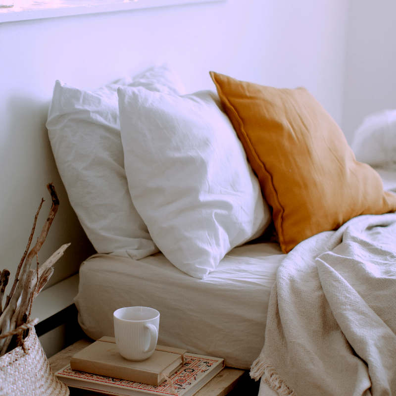 image of pillows on a bed.  Photo by Tatiana Syrikova
