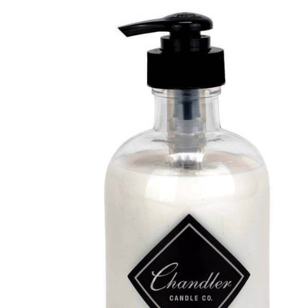 close up image of a bottle of Chandler lotion with black pump top