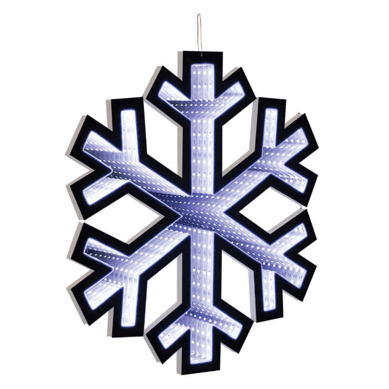 Decorative LED snowflake hanging in a festive setting with Christmas tree and lights.