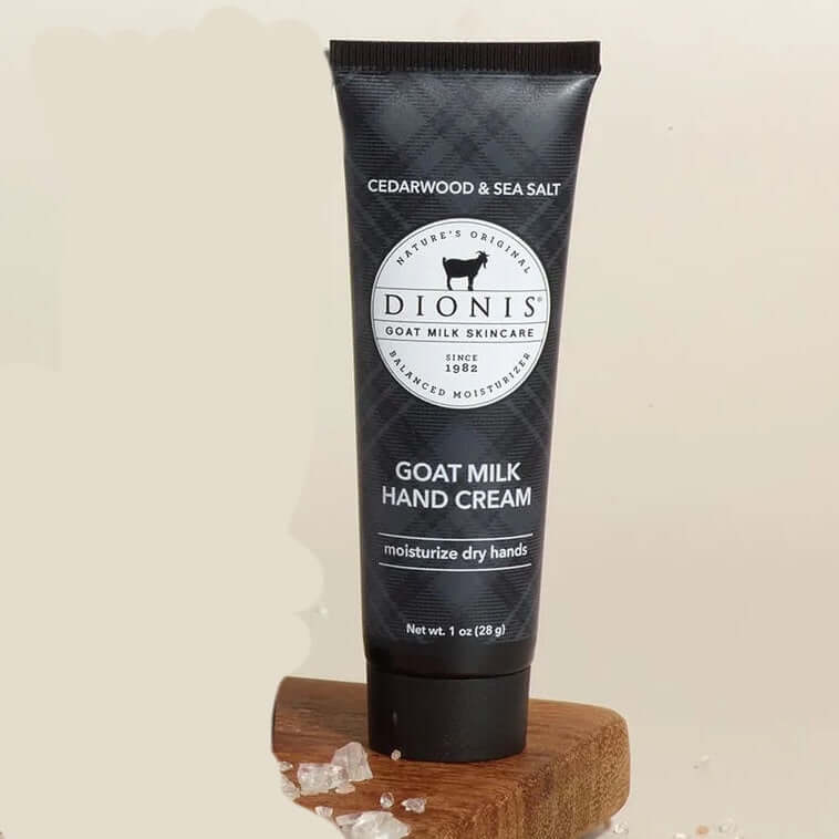 image of an upright tube of lotion in charcoal gray with label in black and white