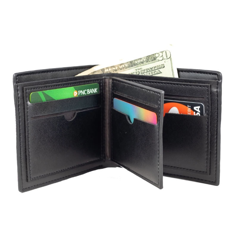 Black leather wallet open showing cards and money on a white background