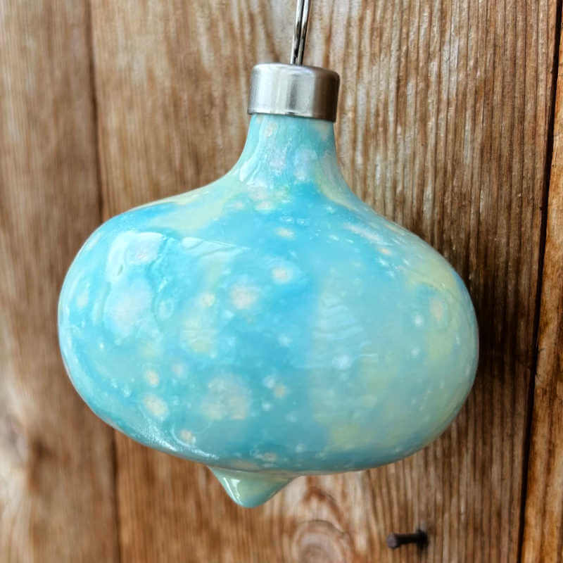 onion shaped ceramic ornament in aqua color