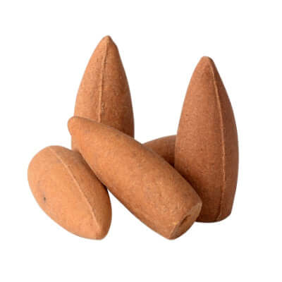 closeup image of five conical shaped medium brown incense cones