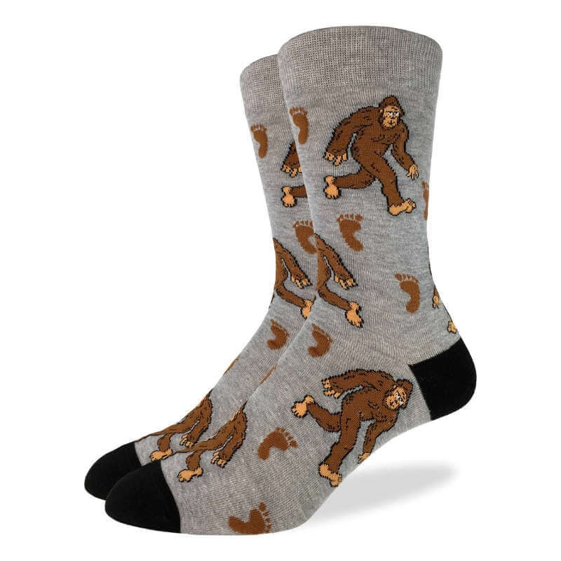 Gray socks with brown Bigfoot prints on a white background