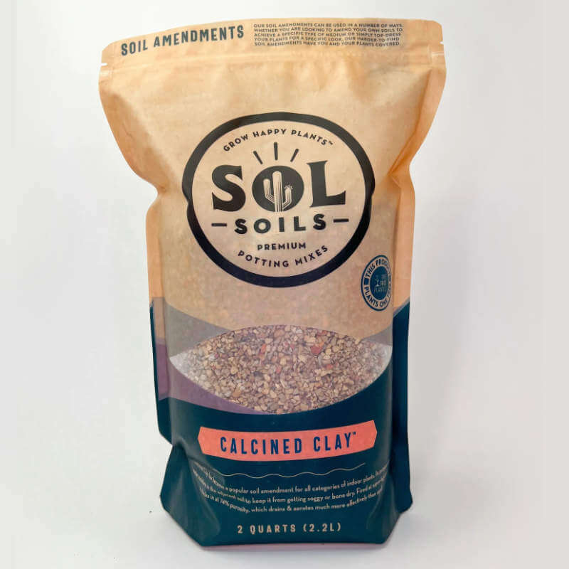 image of a bag with tan upper portion and sol soils logo, with a small window in the middle showing the product, and a green bottom section