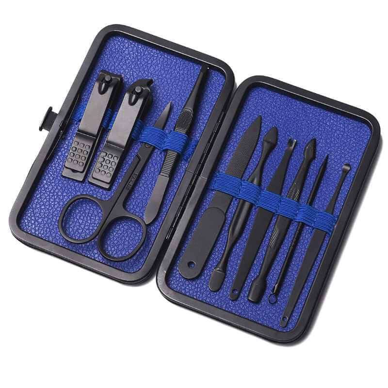 Manicure set with black tools in a blue and black case on a white background