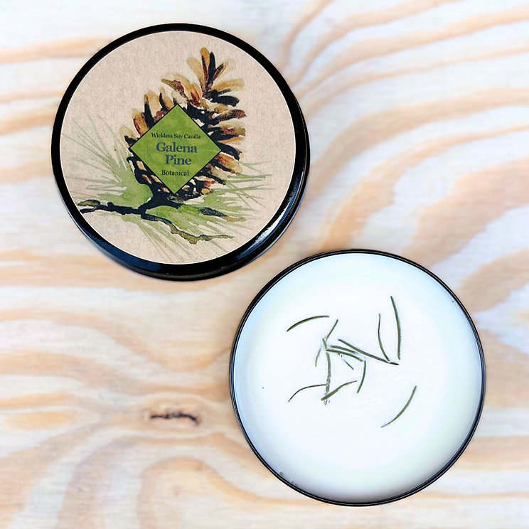 image of lid with a drawing of a pine code and words galena pine.  Open bottom with white soy sprinkled with pine needs