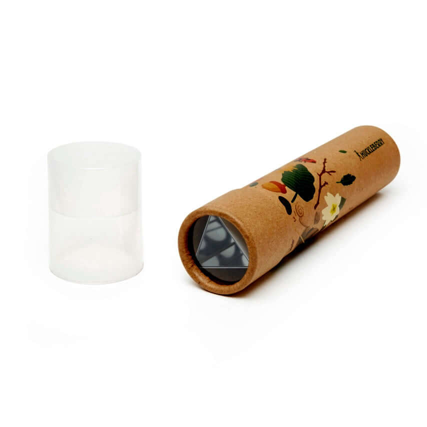image of tan cardboard tube with drawings of leaves and flowers on it, attached to a cardboard backing with drawings of leaves, flowers, ladybugs and a child