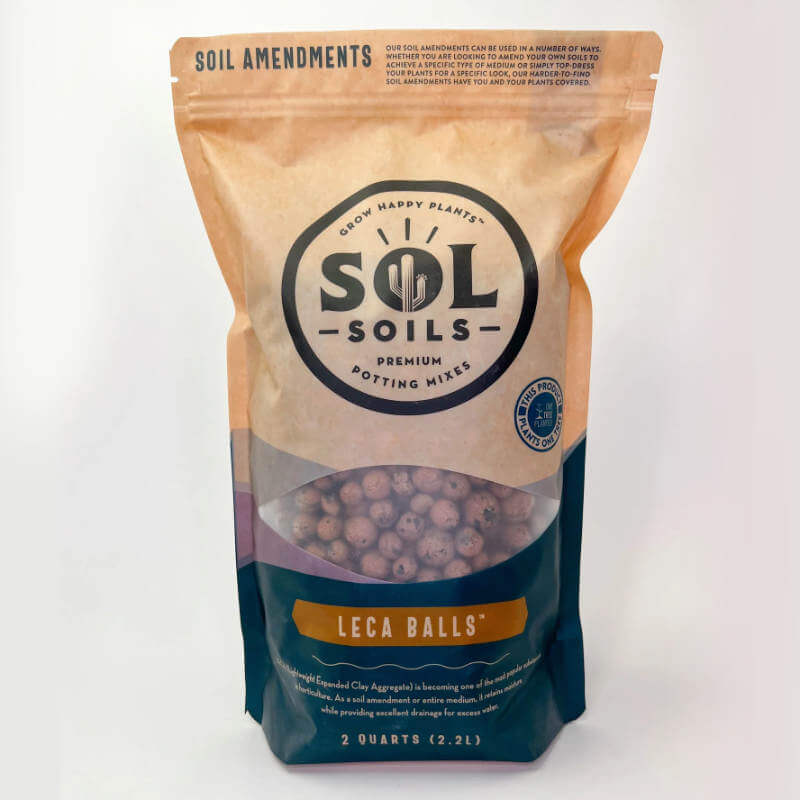 image of a bag with tan upper portion and sol soils logo, with a small window in the middle showing the product, and a green bottom section