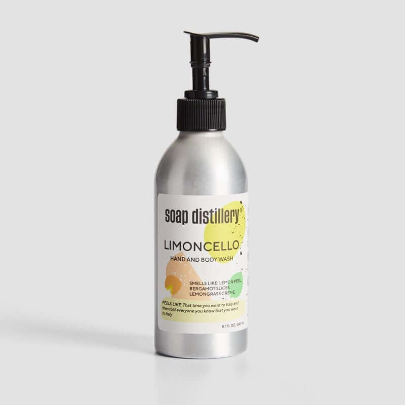 Silver bottle of Soap Distillery Limoncello hand and body wash on a light gray background