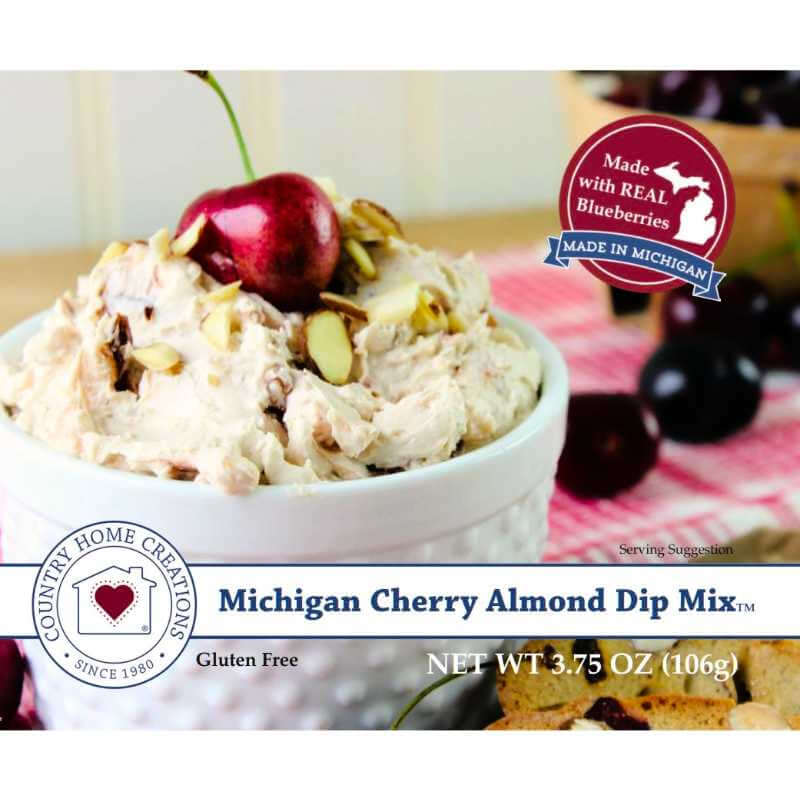 Bowl of Michigan Cherry Almond Dip Mix with blueberry label on a white background