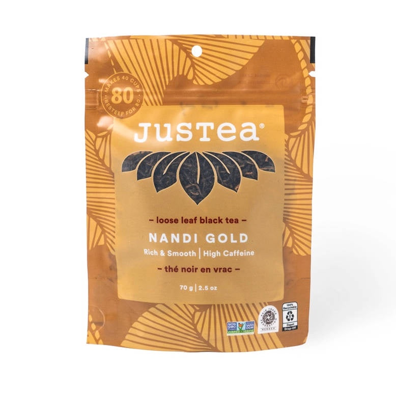 Justea Nandi Gold loose leaf black tea package on a white background