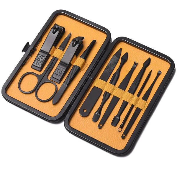 Manicure set with black tools in a blue and black case on a white background