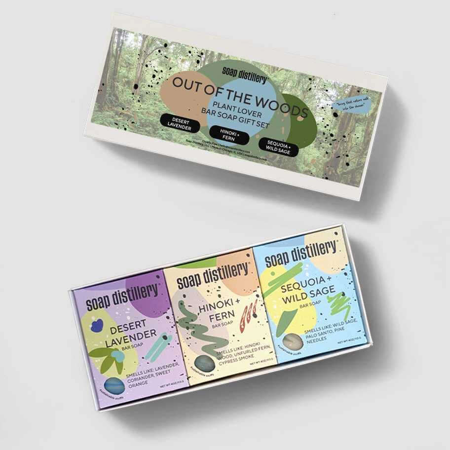 image of two oblong boxes containing three separate scented soaps