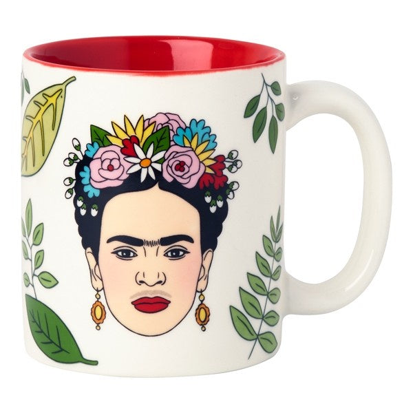 white mug with drawing of Frida Kahlo with floral crown, earrings, surrounded by leaves.  Red interior of mug