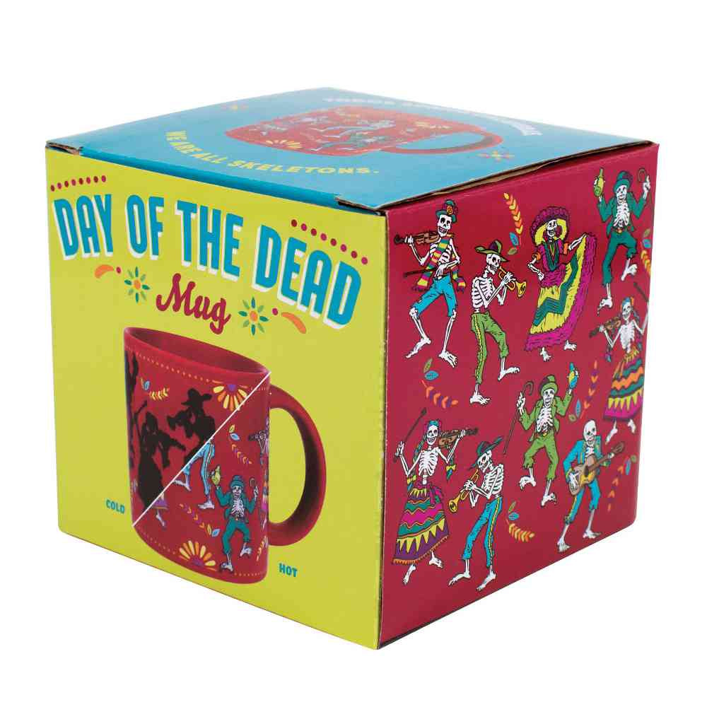 photo of the gift box for the mug with drawings of various skeleton figures and an image of the mug