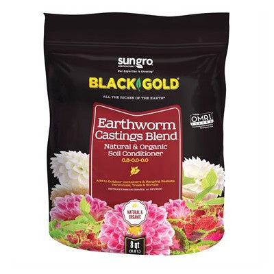 black bag with white logo, black gold brand in yellow and dark red band in middle with name of product.  Multi color blooms encircle the front bottom of the bag
