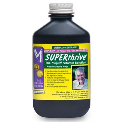 image of rectangular brown plastic bottle with yellow and three SUPERthrive label with instructions and information printed in black