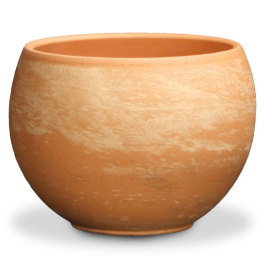 image of globe shaped planter in orange clay color with mottled lighter colored finish.  Opening in top