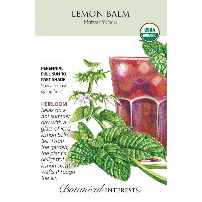 image of seed packet with drawing of a lemon balm stem with oblong heavily veined green leaves and small pink blossom.  A glass of iced tea is in the background.  logo and seed info in black type.  USDA organic logo in upper right corner