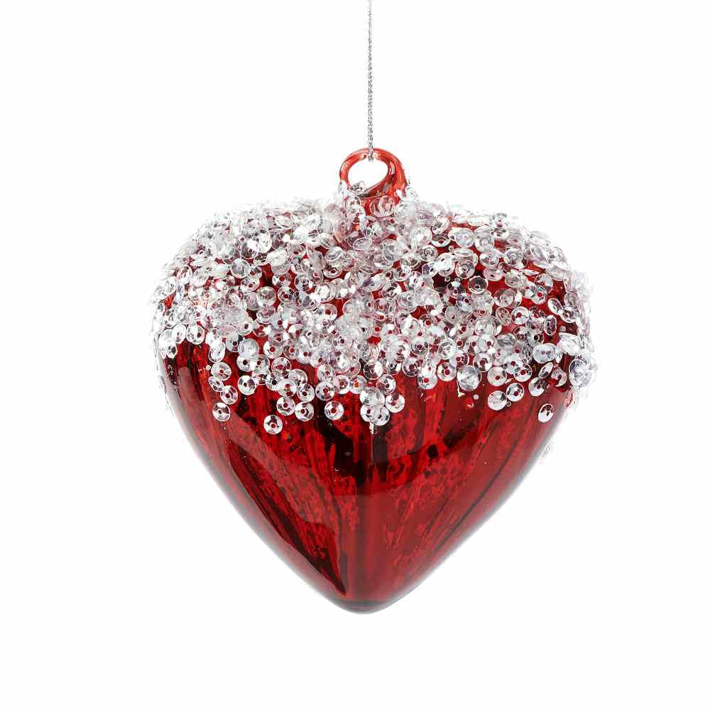 image of red glass style ornament in the shape of a heard, with silvery sequins along the top portion