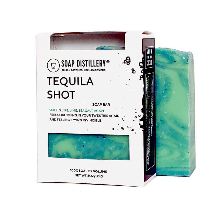black and white box with soap distillery logo, description of soap, and opening to show bright blue and green bar of soap