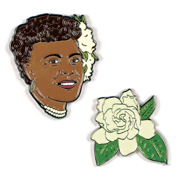 image of two pins.  One of Billie Holiday&#39;s head and the other of a white gardenia