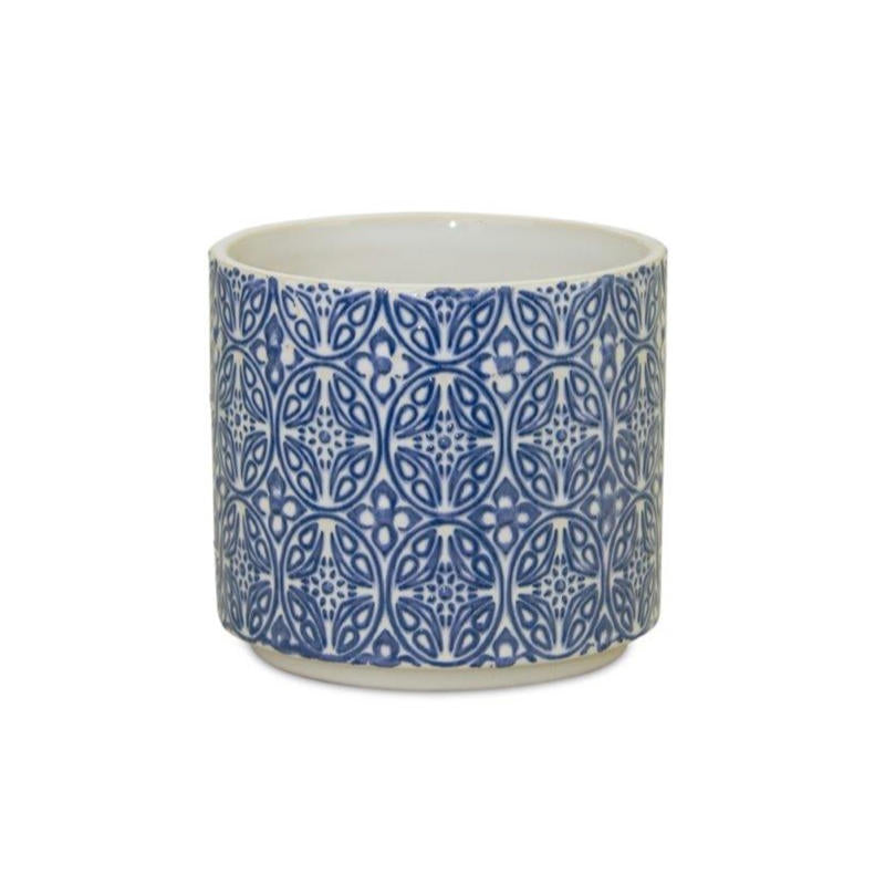 image of large white ceramic pot with delicate blue filigree design on the exterior.