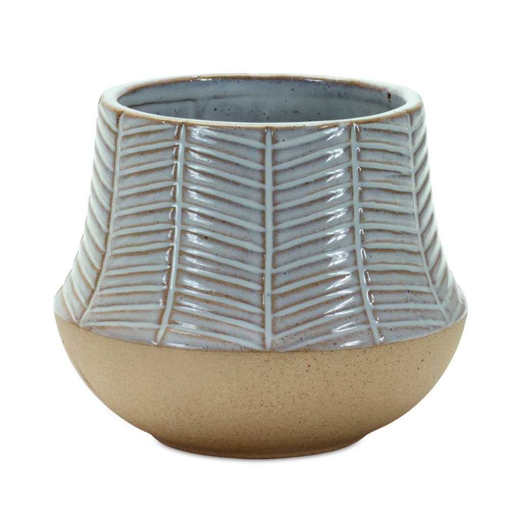 image of pot with round bottom in sand color, with a tapering in top portion that is glazed white with diagonal slashing designs