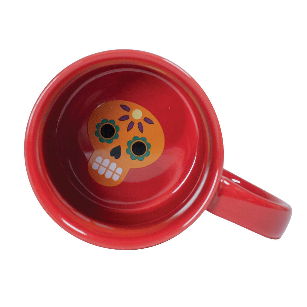 image looking into the bottom inside of the mug, with a cartoon sugar skull on the bottom