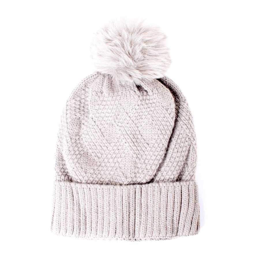 image of off white knitted stocking cap with pom pom