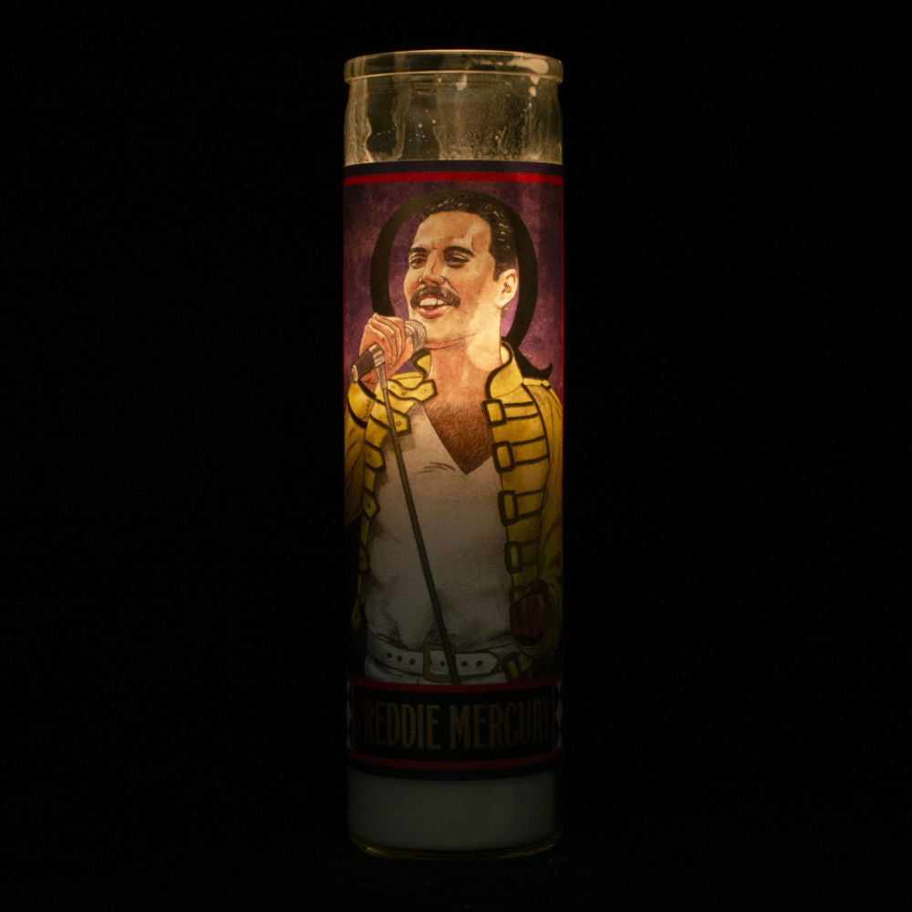 image of tall glass candle with drawing of Freddy Mercury on the front, and an image of the back of the candle with a humorous prayer for Freddy Mercury