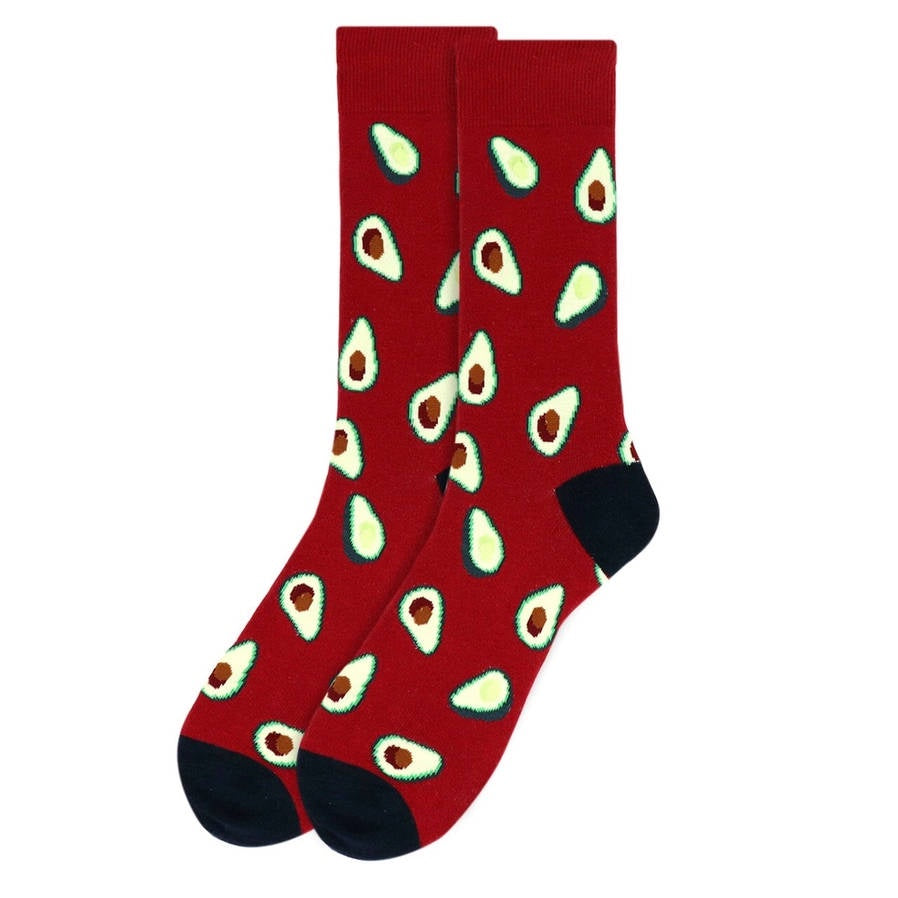 image of pair of red socks with black hell and toe and images of avocado halves on them