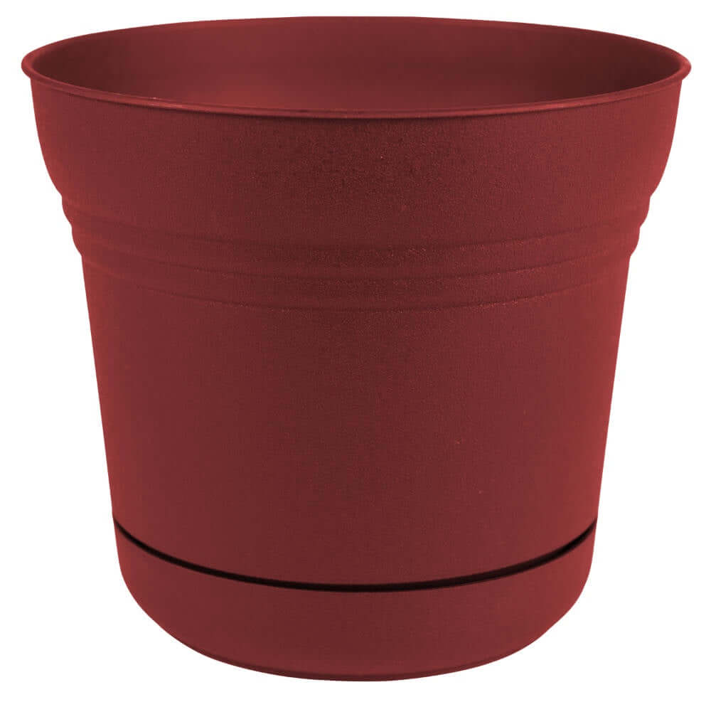 image of round planter with integrated saucer in burnt red color