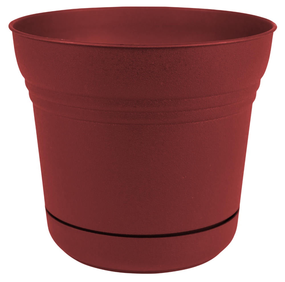 image of round planter with integrated saucer in burnt red color