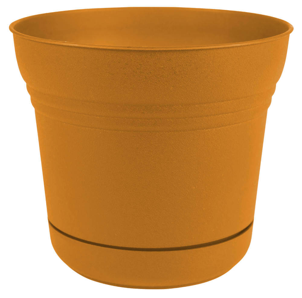 image of round planter with integrated saucer in a bright earthy yellow