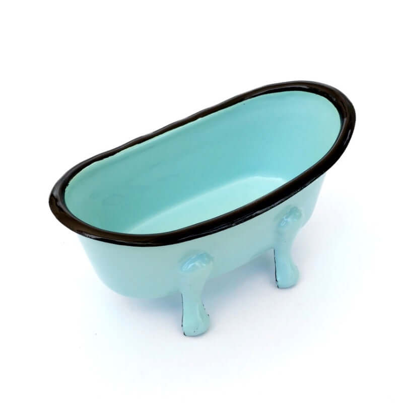 image of oval light blue soap dish in the shape of a claw foot bathtub