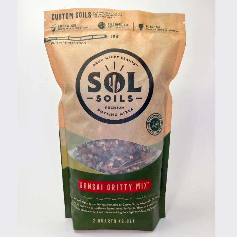 image of a bag with tan upper portion and sol soils logo, with a small window in the middle showing the product, and a green bottom section