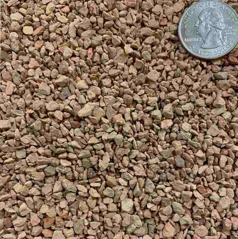 closeup image of product showing chunky ingredients, with a quarter coin in the corner for size comparison