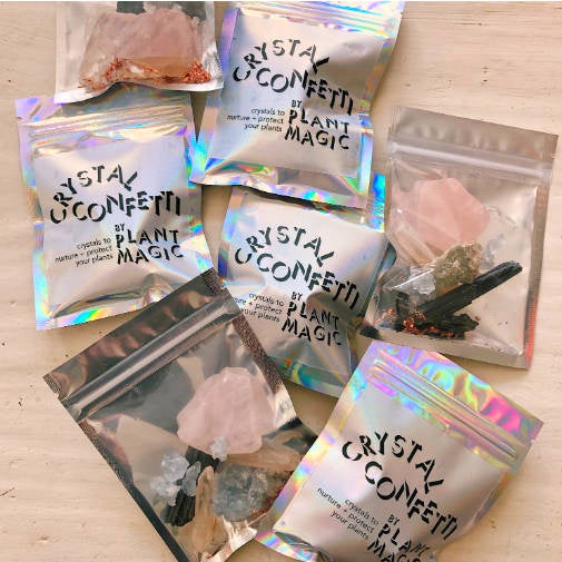 image of several packets of crystals.  Some are clear showing the crystals inside, some have the Crystal confetti label