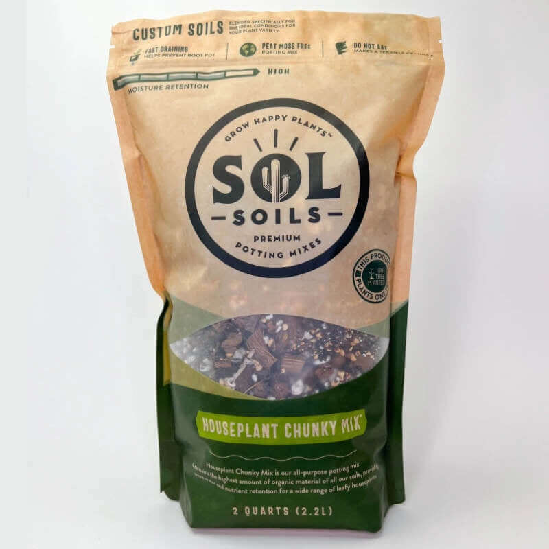 image of a bag with tan upper portion and sol soils logo, with a small window in the middle showing the product, and a green bottom section