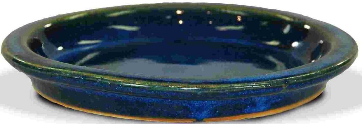 image of blue glazed saucer