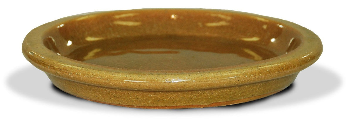 image of golden yellow glazed saucer
