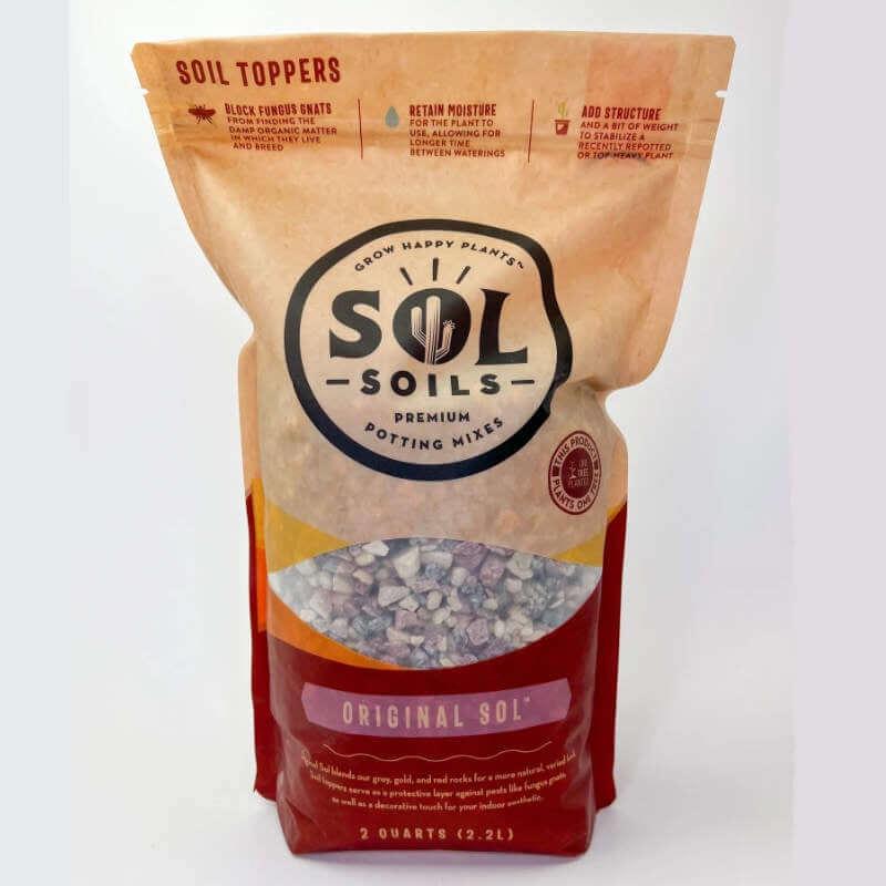 image of a bag with tan upper portion and sol soils logo, with a small window in the middle showing the product, and a dark red bottom section