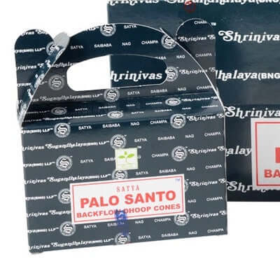 image of a dark charcoal colored cardboard box with handle and label with Palo Santo on it