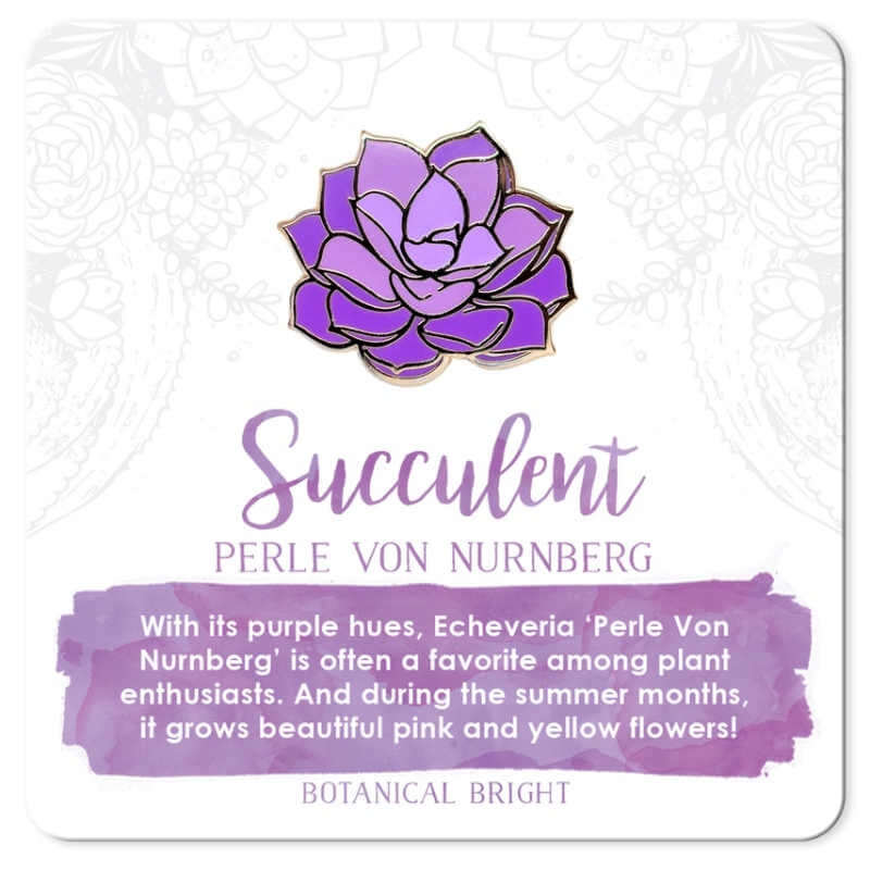 image of an enamel pin of a succulent in light and medium purple colors on a white card with purple writing