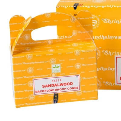 image of bright yellow cardboard box with handle and label stating sandalwood scent on the front
