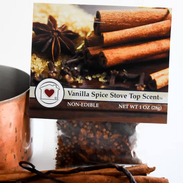 image of package with many dried spices and the label with photos of cinnamon sticks and other spices.