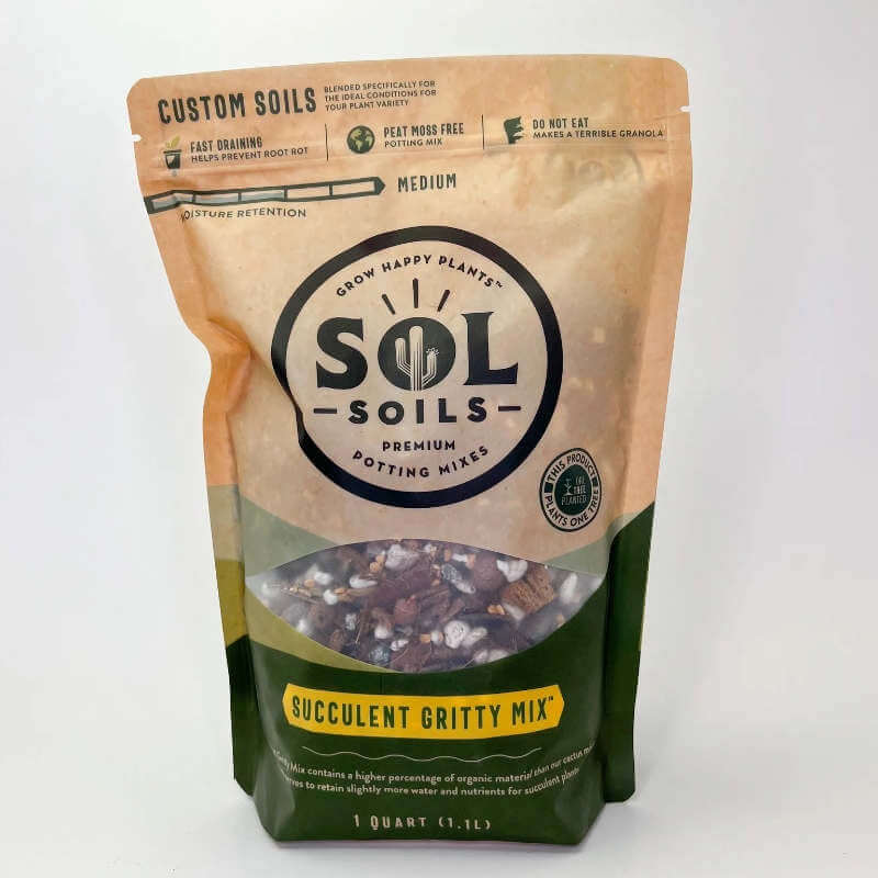 image of a bag with tan upper portion and sol soils logo, with a small window in the middle showing the product, and a green bottom section