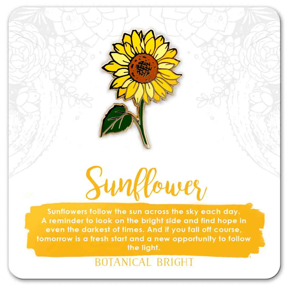 image of pin in shape of a sunflower bloom in bright yellow with dark orange center and dark green stem and leaf.  On a card with description in yellow and white